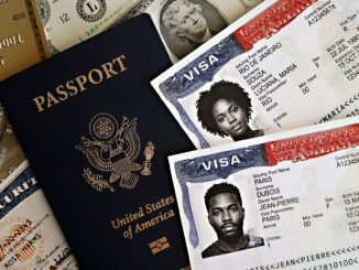 Close-up of a U.S. passport with visas and currency, symbolizing international travel and immigration.