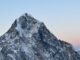 Snow-capped peak in the Himalayas, Nepal, captured during a serene sunset.