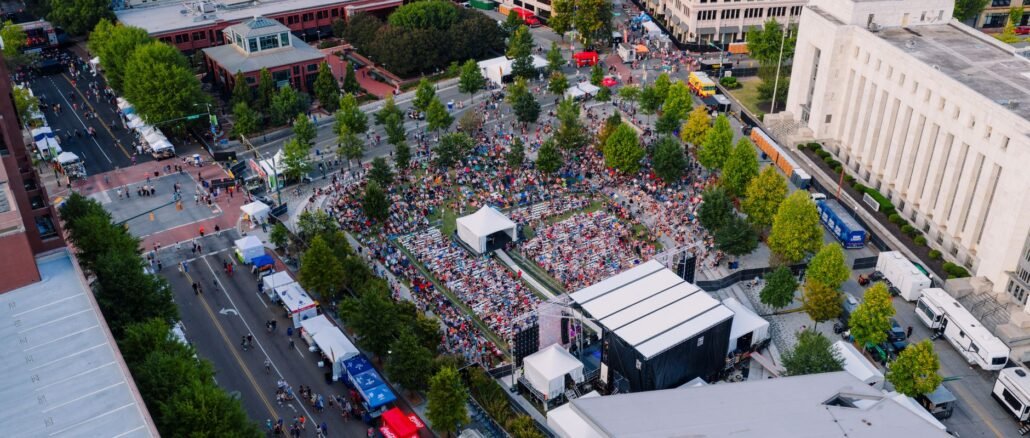 Drone captures vibrant outdoor concert crowd in central Chattanooga, Tennessee.
