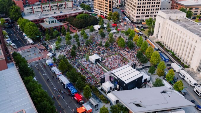 Drone captures vibrant outdoor concert crowd in central Chattanooga, Tennessee.