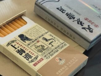Open box of nicotine-free teabacco with vintage Shanghai design.